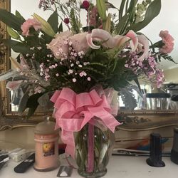 Suzanne's Designs - $115 for this arrangement, delivered in Luling.
