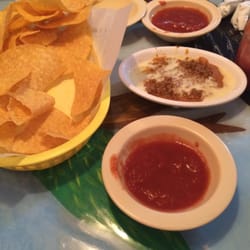 Plaza Jalisco - Chips and salsa and cheese dip with meat while you wait for your meal.
