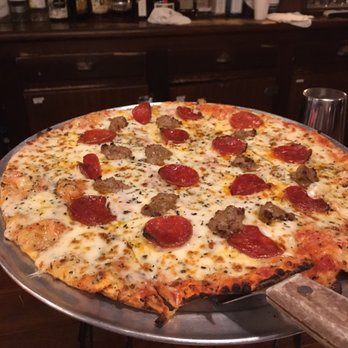 Vinny Vanucchi's - Thin crust pizza... yum! - Italian Near Me - Dubuque, Iowa Vinny Vanucchi's - Thin crust pizza... yum! - Italian Near Me - Dubuque, Iowa