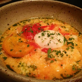 Husk - Grits with a 165 degree egg (part of the veggie plate) - Southern Near Me - Nashville, Tennessee Husk - Grits with a 165 degree egg (part of the veggie plate) - Southern Near Me - Nashville, Tennessee