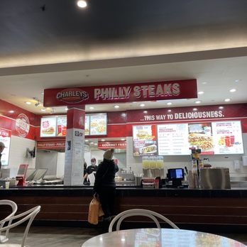 Charleys Cheesesteaks - a woman standing in front of the counter - Cheesesteaks Near Me - Paramus, New Jersey Charleys Cheesesteaks - a woman standing in front of the counter - Cheesesteaks Near Me - Paramus, New Jersey