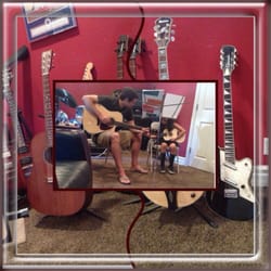 MusicMatchr - Taylor teaching my daughter guitar basics.