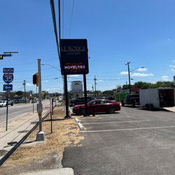 Le Rouge Boutique - Look for our sign at 53rd and Cameron