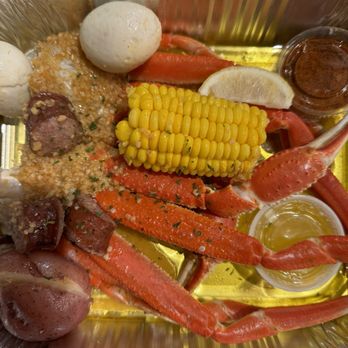 HappyRito Seafood - Snow crab legs, corn, sausage, potatoes and boiled eggs in garlic & butter. - Cajun/Creole Near Me - Cedar Park, Texas HappyRito Seafood - Snow crab legs, corn, sausage, potatoes and boiled eggs in garlic & butter. - Cajun/Creole Near Me - Cedar Park, Texas
