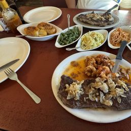 Ribeye, NY and sautéed spicy shrimp, potatoes ana, rice, green beans and spaghetti