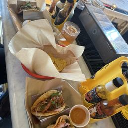 Chips and tacos and hot sauce