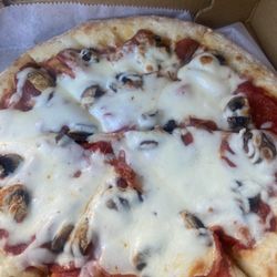 Eddies Carryout - Pizza has good toppings and cheese but was under cooked. Needed a few more minutes.
