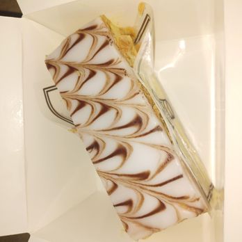 Fleur de Cocoa - Aerial shot of mille-feuille inside the box - Bakeries Near Me - Los Gatos, California Fleur de Cocoa - Aerial shot of mille-feuille inside the box - Bakeries Near Me - Los Gatos, California