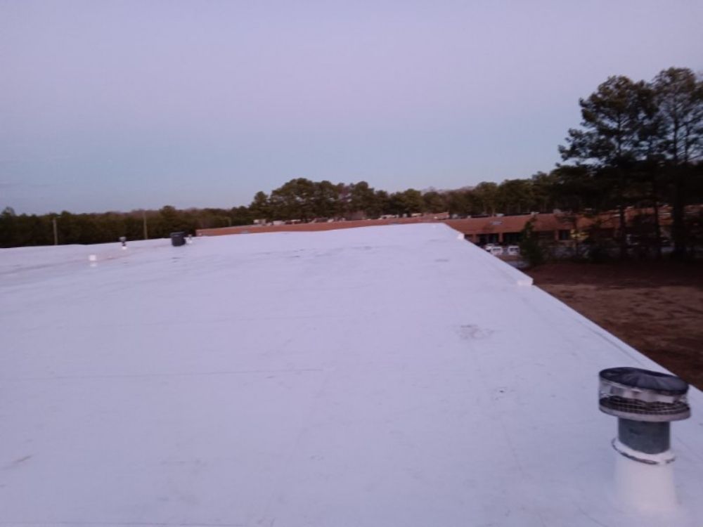 Slide of E. Thompson Roofing