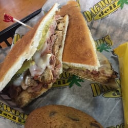 Dagwood's Deli - Cuban Sammich. Pork tenderloin, ham, cheese, pickles and mustard on pressed bread served hot.