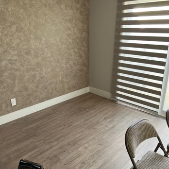 AAA Painting and Flooring - a living room with wood floors - Flooring Near Me AAA Painting and Flooring - a living room with wood floors - Flooring Near Me