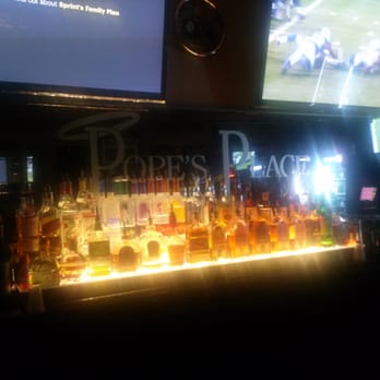 Pope's Place - a bar with a lot of bottles of liquor - Sports Bars Near Me - Pittsburgh, Pennsylvania