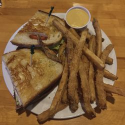 Bleachers Sports Bar & Grill - BLT, battered fries, and a side of honey mustard.