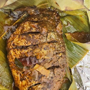 Cochin Delights - a fish wrapped in banana leaves - Indian Near Me - London, Ontario Cochin Delights - a fish wrapped in banana leaves - Indian Near Me - London, Ontario