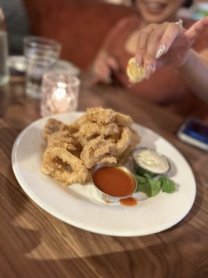 Photo of Felice 56 - New York, NY, US. a plate of fried food with dipping sauce