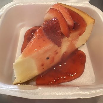 Taylor’s Kitchen & Catering - Cheesecake with strawberry sauce. - Sandwiches Near Me - Lonoke, Arkansas Taylor’s Kitchen & Catering - Cheesecake with strawberry sauce. - Sandwiches Near Me - Lonoke, Arkansas