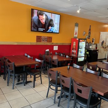 You Me Sushi - a restaurant with tables and chairs - Japanese Near Me - Fresno, California