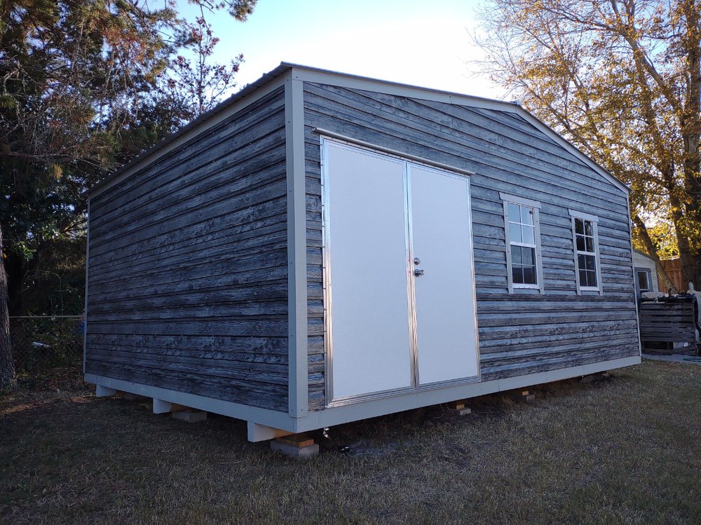 Slide of Tool Time Building & Roofing