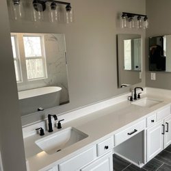 Insta Pro Construction - repainted vanity with quartz countertop