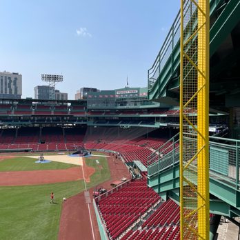 Fenway Park Tours - The view from the Green Monster seats, with the foul pole that Carlton Fisk's game-winning homer narrowly missed in the 1975 World Series. - Tours Near Me - Boston, Massachusetts