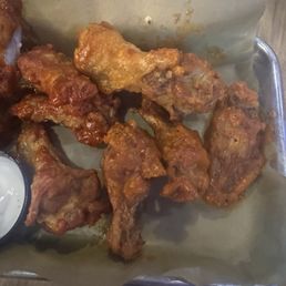 The wings were small, tough with little to no sauce. I ordered wild and spicy garlic..