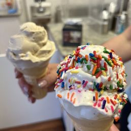 an ice cream cone with sprinkles