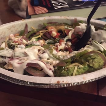 Chipotle Mexican Grill - Believe it or not, this is an uneaten veggie bowl, without rice. You don't get more beans or veggie fajitas. Worst $10 spent. - Mexican Near Me - Toronto, Ontario