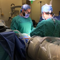 Robert Ravinsky, MD - Robert Ravinsky MD and a colleague, stabilizing a lumbar burst fracture