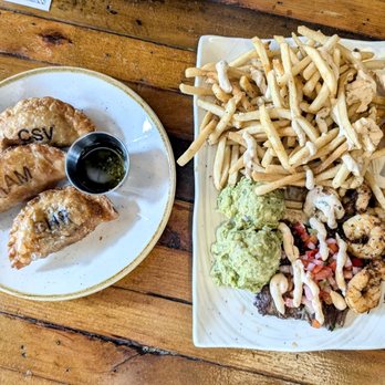 Ché - Steak frites with blackened Argentine shrimp; short rib, chicken salsa verde, and jamon y queso empanada - Argentine Near Me - Cincinnati, Ohio