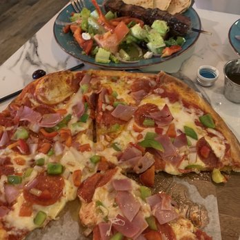 The Oasis Cafe - Oasis special pizza - Cafes Near Me - Flushing, New York