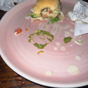 Jimmy John's - a half eaten sandwich on a pink plate - Delis Near Me - Commerce Township, Michigan Jimmy John's - a half eaten sandwich on a pink plate - Delis Near Me - Commerce Township, Michigan