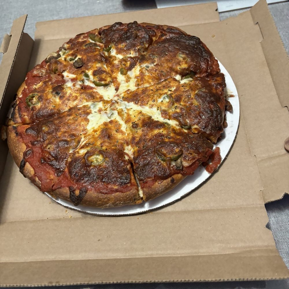 a pizza in a pizza box a pizza in a pizza box