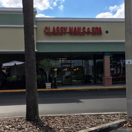 In small shopping center (NW corner) next to Cork & Fork