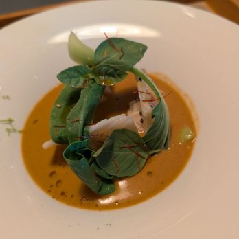Mathias Dahlgren Matbaren - Lobster soup with red curry steamed snow crab dumplings, pak choi, thai basil - Swedish Near Me - Stockholm, Alberta