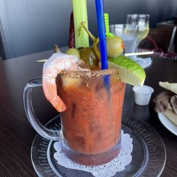 $15 Bloody Mary. Lots of accoutrements, including shrimp, bacon and a pepperoni stick. $15 Bloody Mary. Lots of accoutrements, including shrimp, bacon and a pepperoni stick.