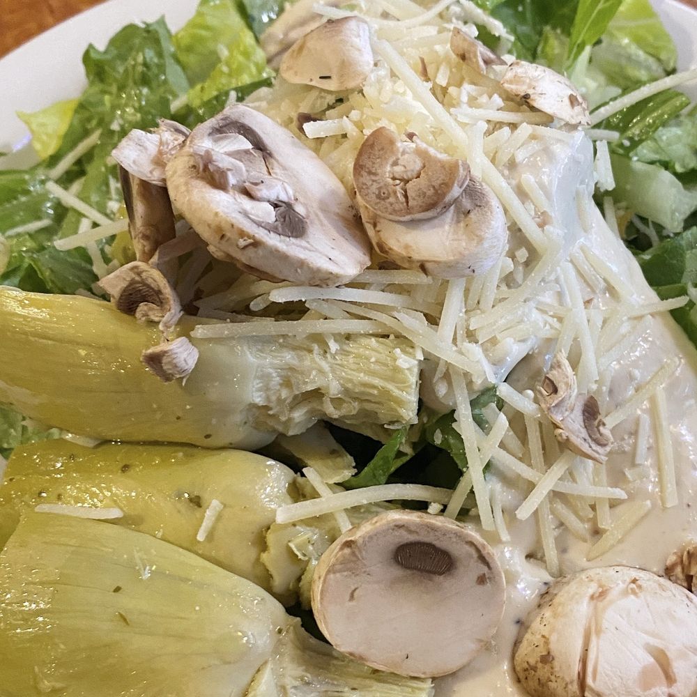 Sizzler - Cesar Salad with Artichoke Hearts, Mushrooms, and Cheese - Steakhouses Near Me - West Covina, California Sizzler - Cesar Salad with Artichoke Hearts, Mushrooms, and Cheese - Steakhouses Near Me - West Covina, California