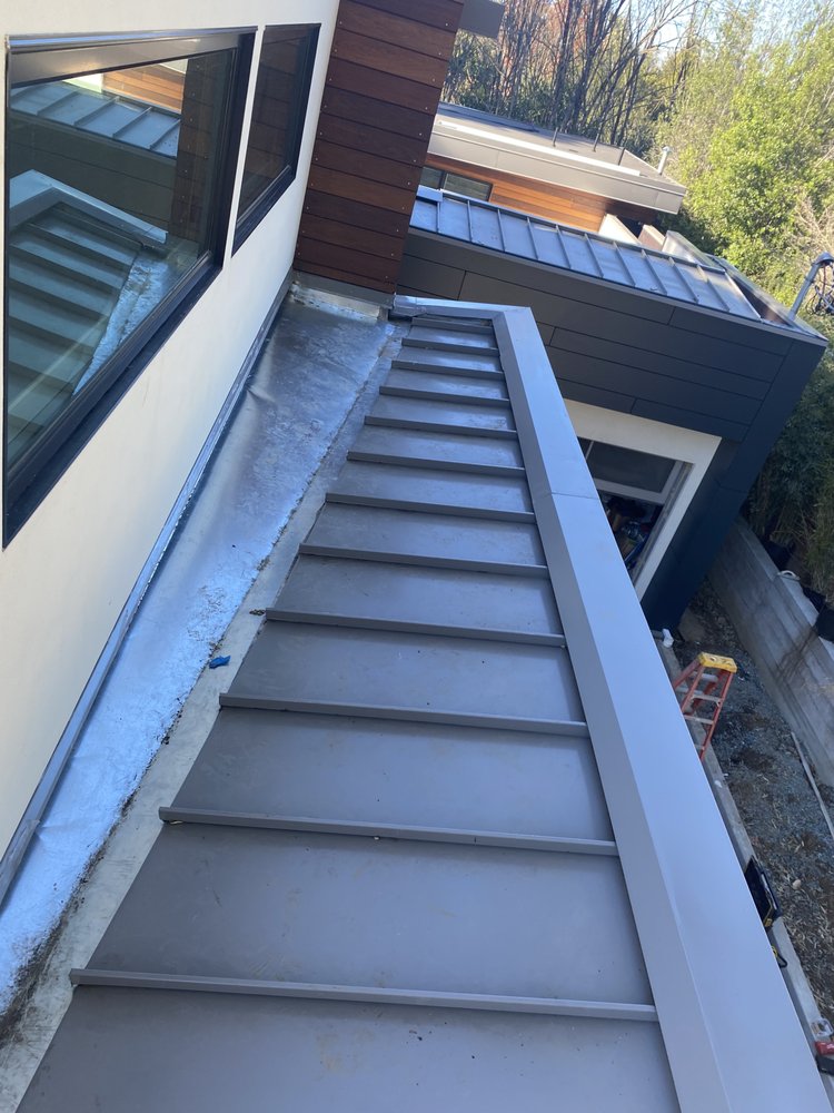 Slide of New Roof Repair Gutters