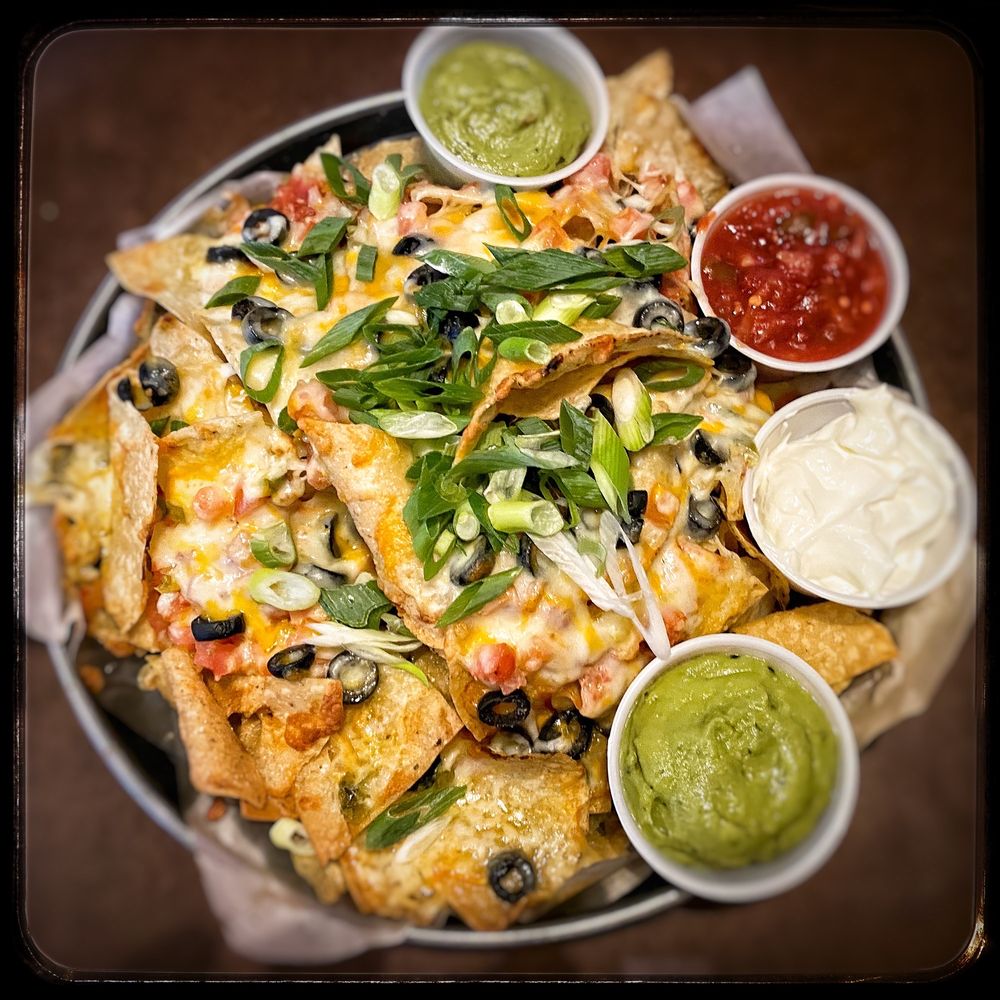 Casey's Bar & Grill - Fiesta Nachos. - absolutely delicious. - Bars Near Me - North Bay, Ontario Casey's Bar & Grill - Fiesta Nachos. - absolutely delicious. - Bars Near Me - North Bay, Ontario