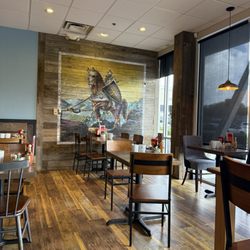 First Watch - Dining area with Knights mural