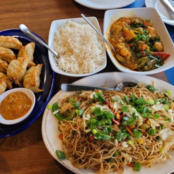Prince Palace Indian Bistro - Our spread - chow fun, momo (dumplings and rice. Some of the best Indian we have had OTP! - Indian Near Me - Kennesaw, Georgia Prince Palace Indian Bistro - Our spread - chow fun, momo (dumplings and rice. Some of the best Indian we have had OTP! - Indian Near Me - Kennesaw, Georgia