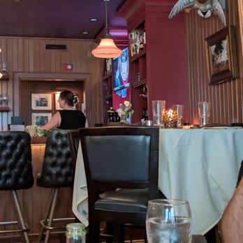 Halls Chophouse - This is the room to the right of the main room. I would rate the ambiance as elegant. - Steakhouses Near Me - Charleston, South Carolina