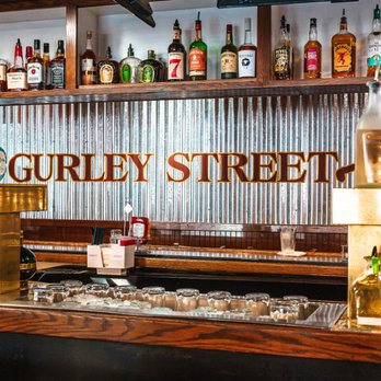 Gurley St Grill - a bar with bottles of alcohol - American Near Me - Prescott, Arizona Gurley St Grill - a bar with bottles of alcohol - American Near Me - Prescott, Arizona