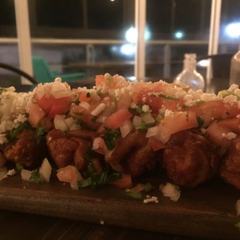 Turquesa - Sliced and beautifully presented Chimichanga - Seafood Near Me - San Carlos Nuevo Guaymas, SON Turquesa - Sliced and beautifully presented Chimichanga - Seafood Near Me - San Carlos Nuevo Guaymas, SON