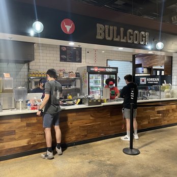 Bullgogi - two people standing at a counter - Korean Near Me - Marietta, Georgia Bullgogi - two people standing at a counter - Korean Near Me - Marietta, Georgia