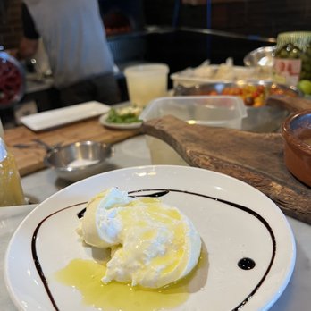 S Egidio - a plate of food on a table - Pizza Near Me - Ridgewood, New Jersey
