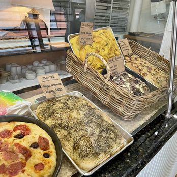 Pane Nudo - a variety of pizzas on display - Bakeries Near Me - Hilo, Hawaii