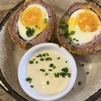 Makars Gourmet Mash Bar - Yummy egg appetizer wrapped in pork and deep fried in Panko bread crumbs. - Scottish Near Me - Old Town, EDH Makars Gourmet Mash Bar - Yummy egg appetizer wrapped in pork and deep fried in Panko bread crumbs. - Scottish Near Me - Old Town, EDH