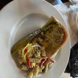 Pasta and curry chicken pita, half sandwich. Pasta and curry chicken pita, half sandwich.