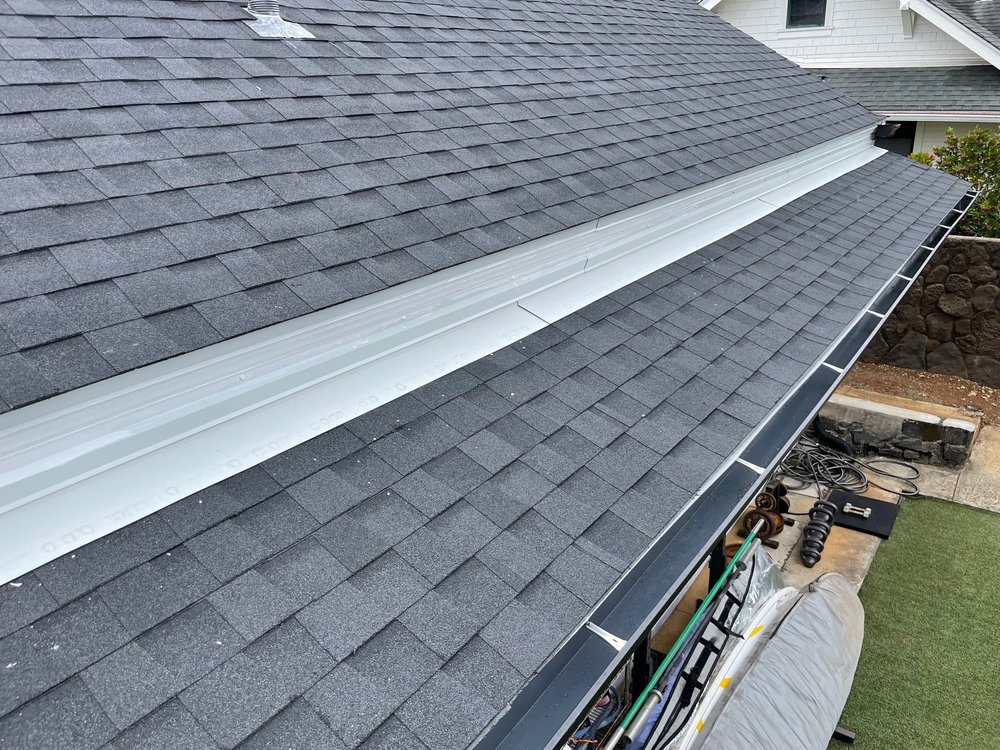 Slide of Tulba's Roofing