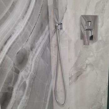 Martos Development - a shower in a bathroom - General Contractors Near Me - New Rochelle, New York